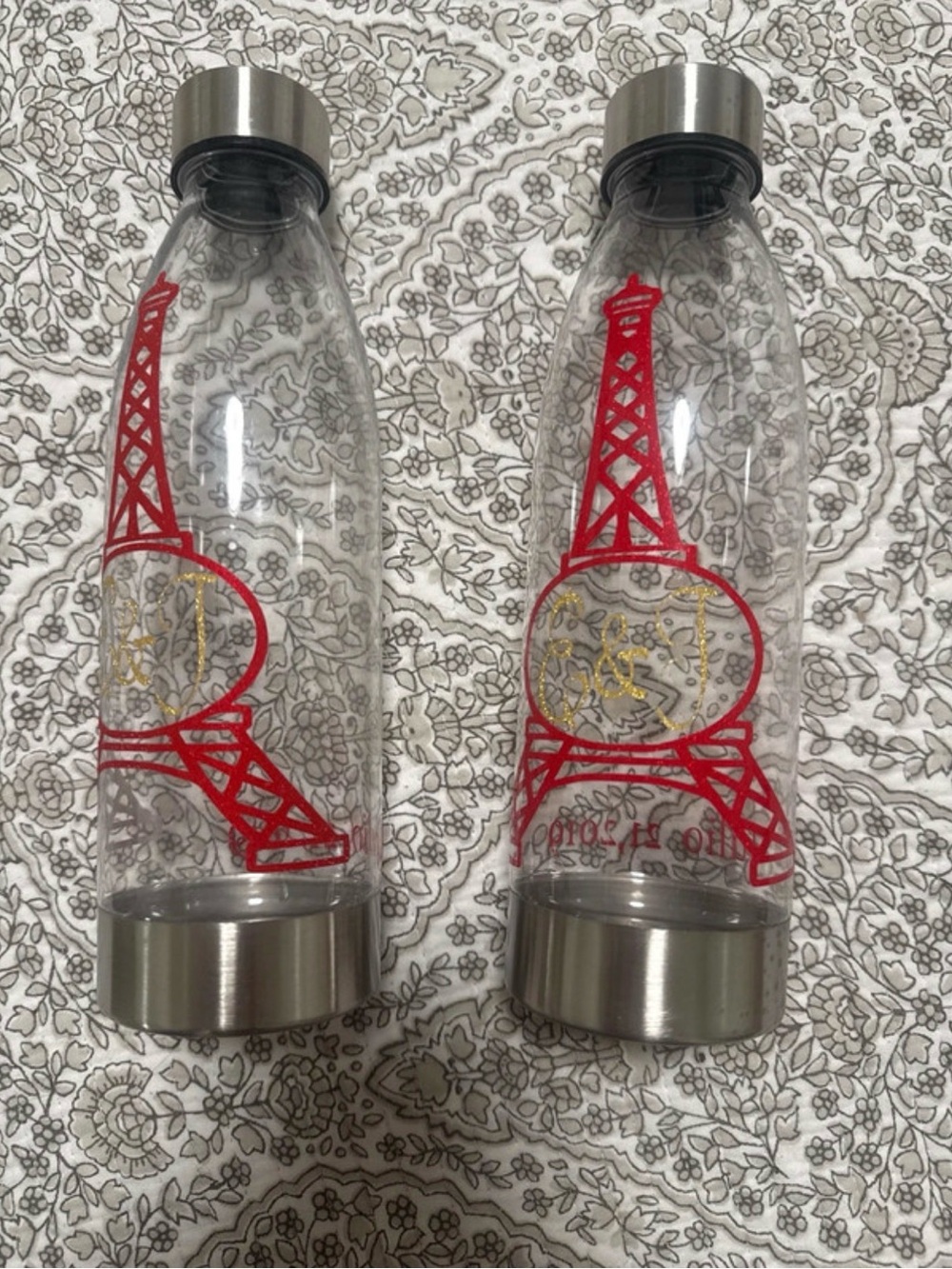 Total of 8 Clear Plastic Water Bottle with Red Eiffel Tower Design